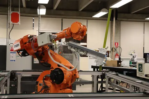 An industrial robot arm in a workshop